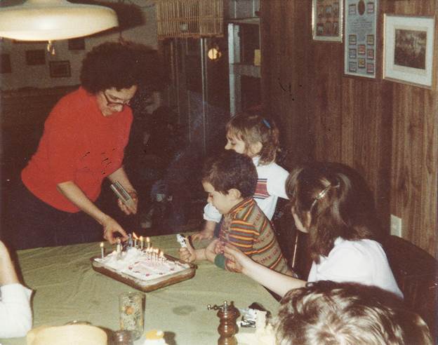 Ryan and Melanie's fifth birthday part featuring a one half Hoth the ice planet cake.