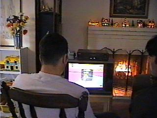 A person sitting in front of a computer

Description automatically generated with low confidence