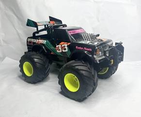 A toy monster truck with large wheels

Description automatically generated