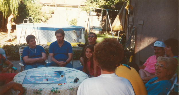 A group of people sitting around a table

Description automatically generated with medium confidence