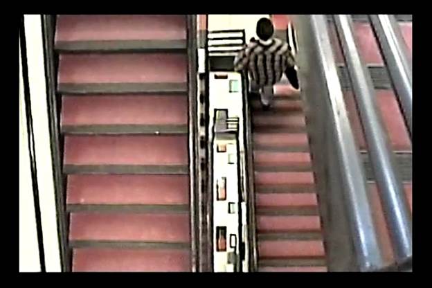 A person walking down a flight of stairs

Description automatically generated with medium confidence